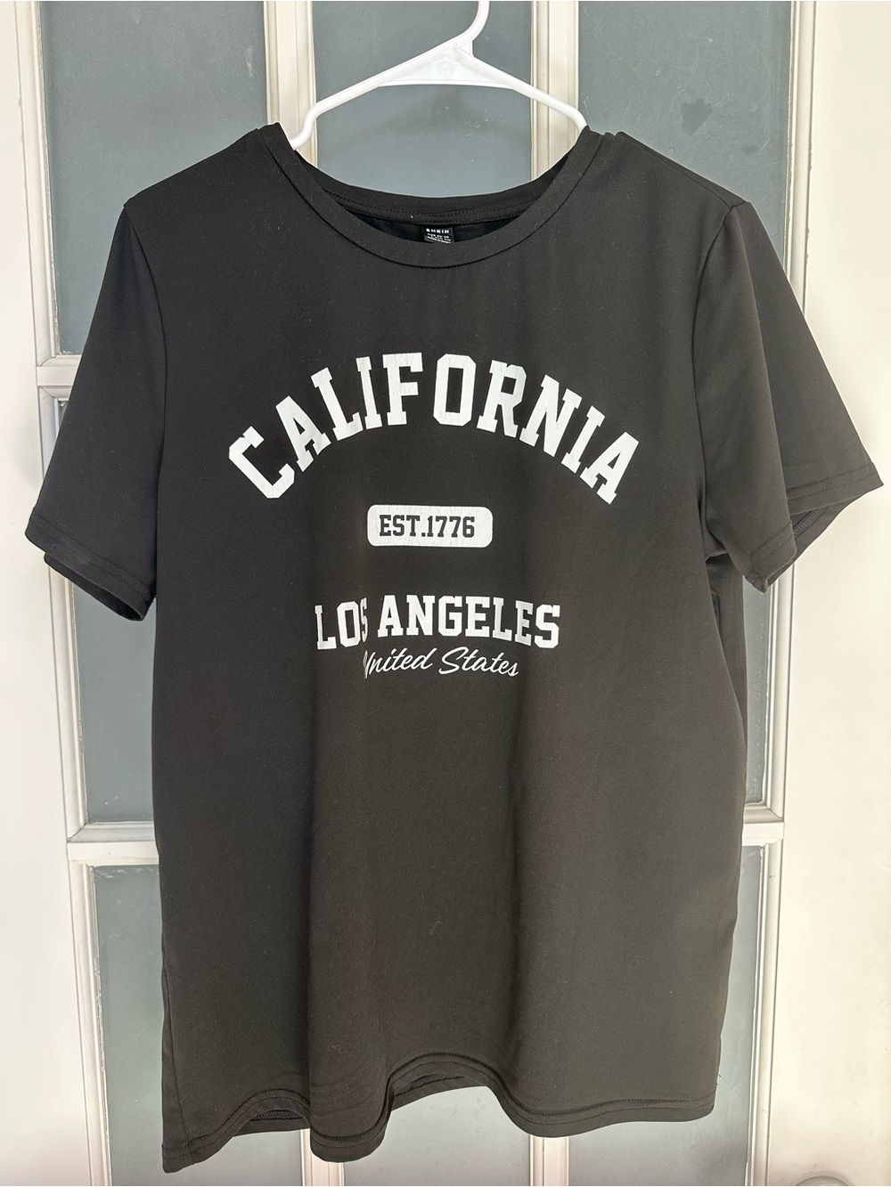 SHEIN Black Crewneck Tee with White Label